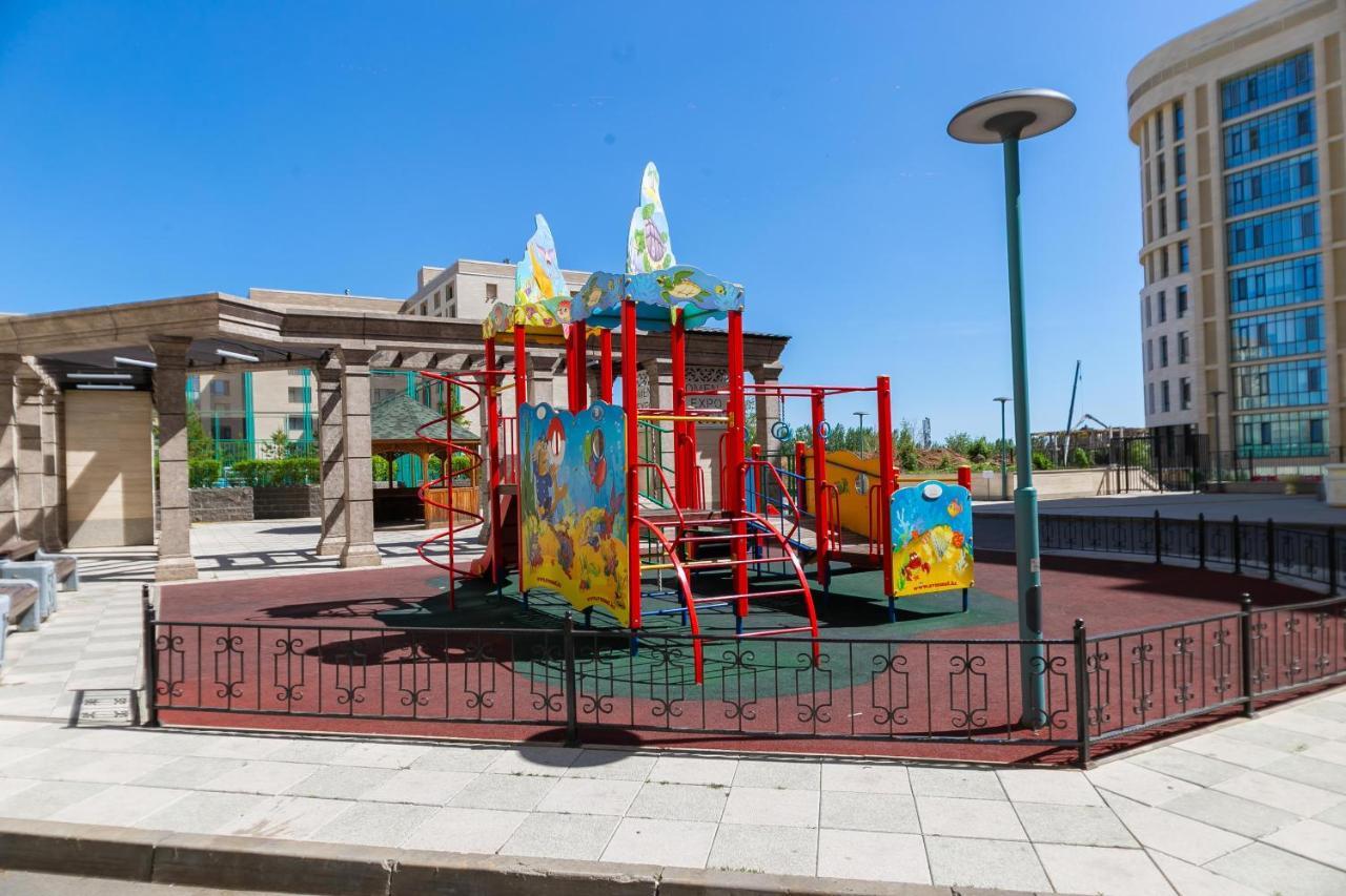 В Promenade Expo Квартира С Романтическим Видом Astana Exteriör bild